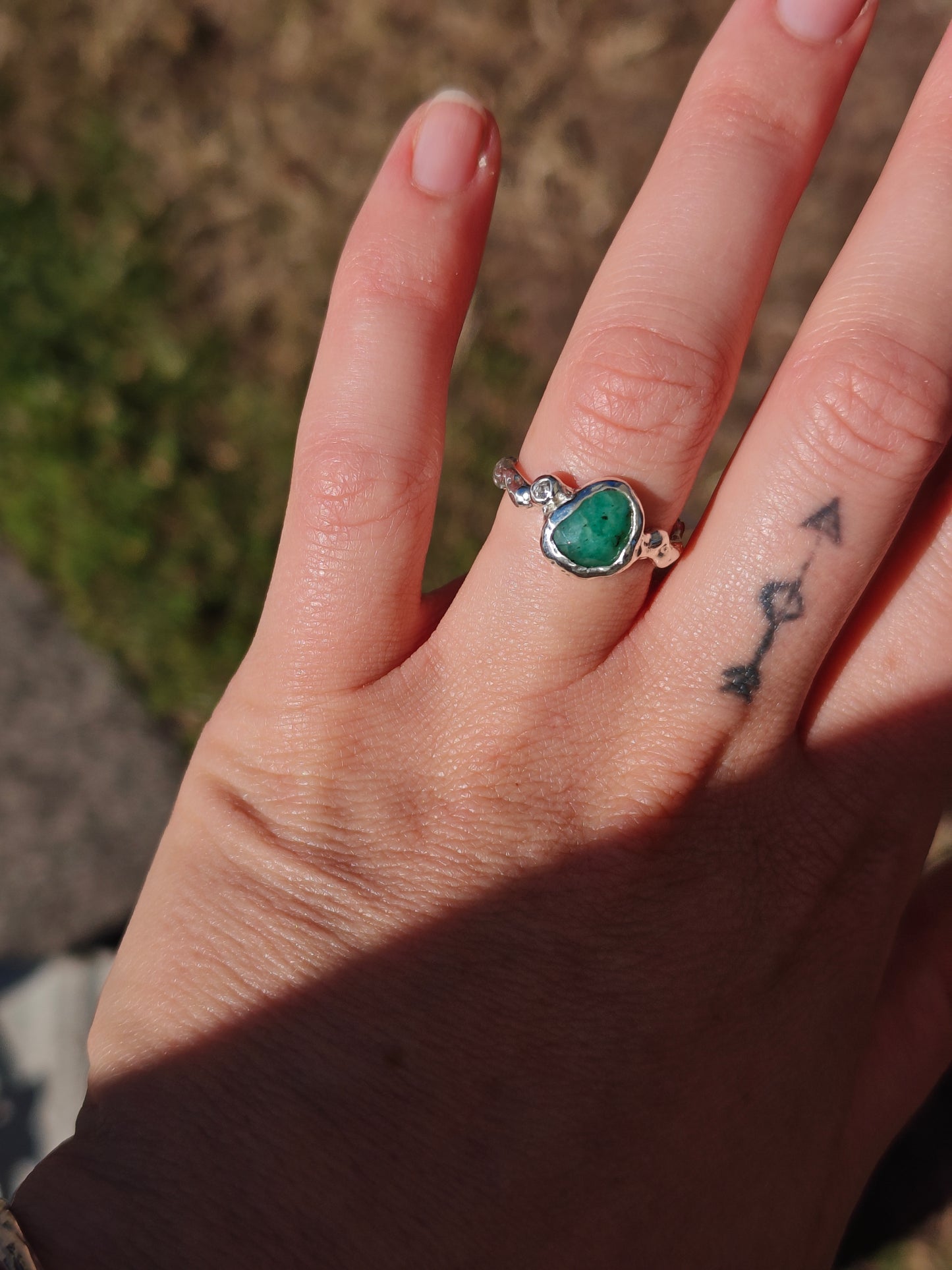 Emerald Orbit Ring